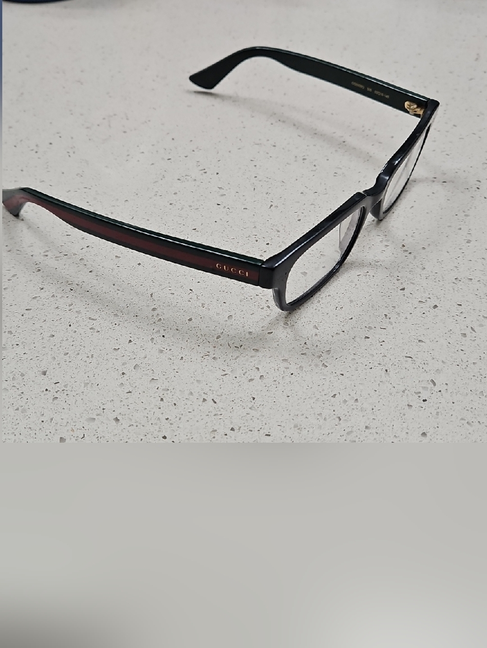 Gucci Black Frames with Red/Green Temple Stripe and Gold GUCCI Lettering.